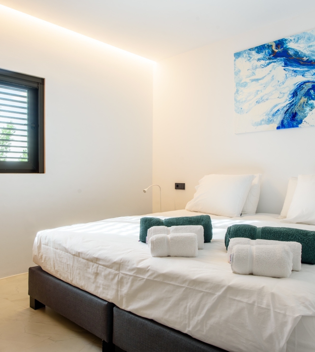 Resa Estates Ibiza villa for sale es Cubells modern heated pool bedroom.jpg